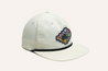 A white Zilker Sessions Rope Hat featuring a colorful embroidered patch with a design of a horse and geometric shapes on the front, perfect for any SlackerTide fan.